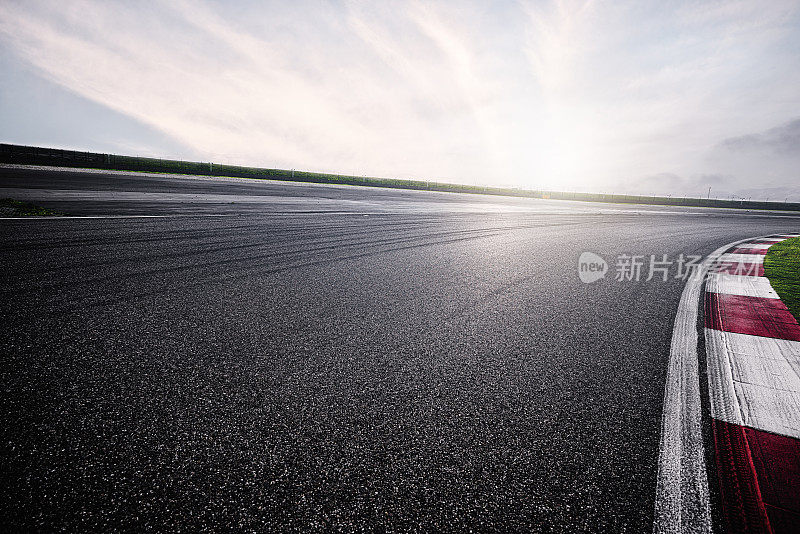 Empty Racing Track With Sunlight